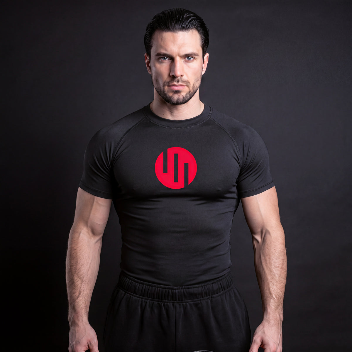 Viltrumite Compression Shirt Black & Red short sleeve on model, front view
