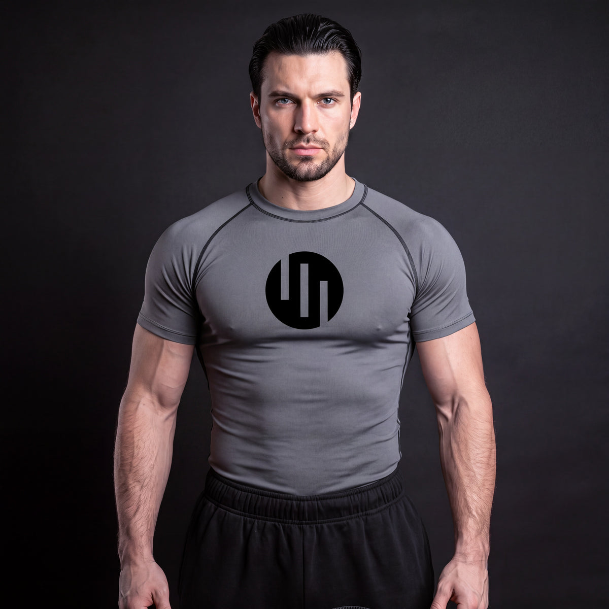 Viltrumite Compression Shirt Gray & Black short sleeve on model, front view