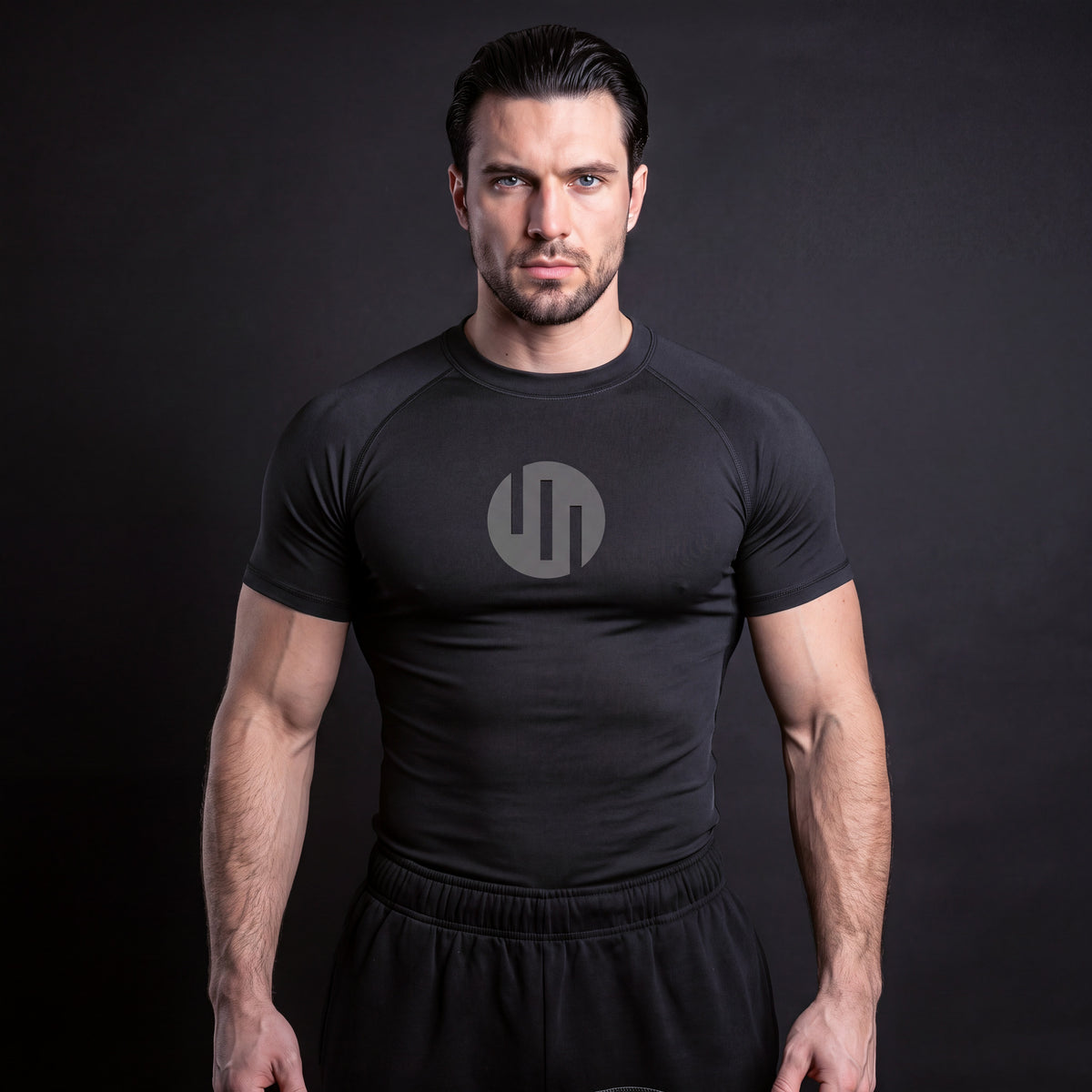 Viltrumite Compression Shirt Black & Gray short sleeve on model, front view