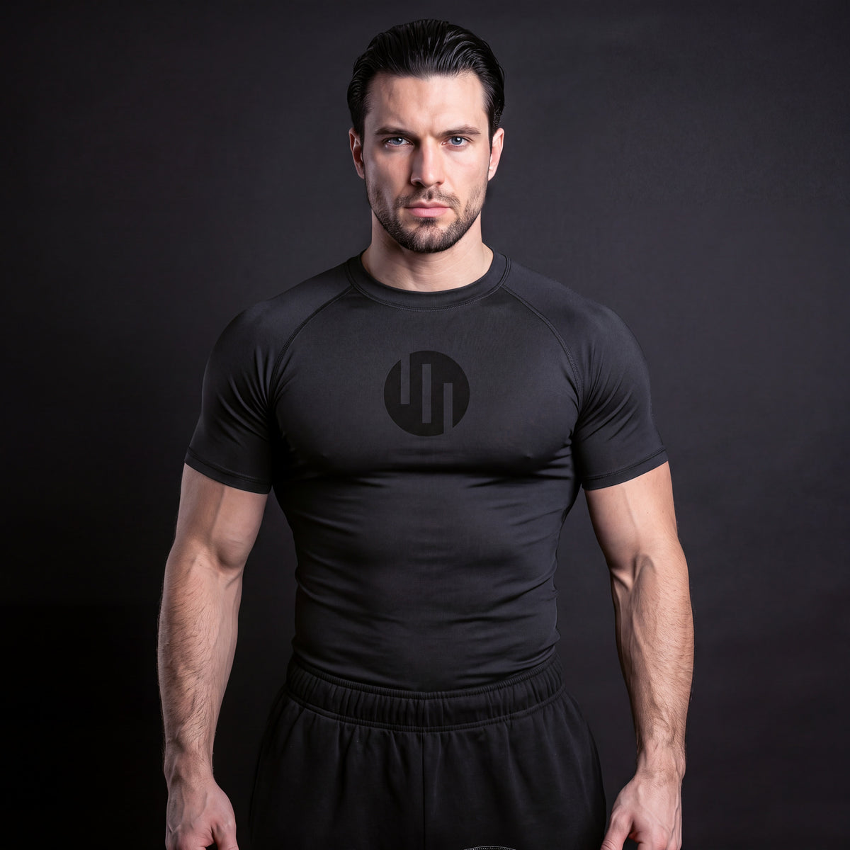 Viltrumite Compression Shirt Total Black short sleeve on model, front view