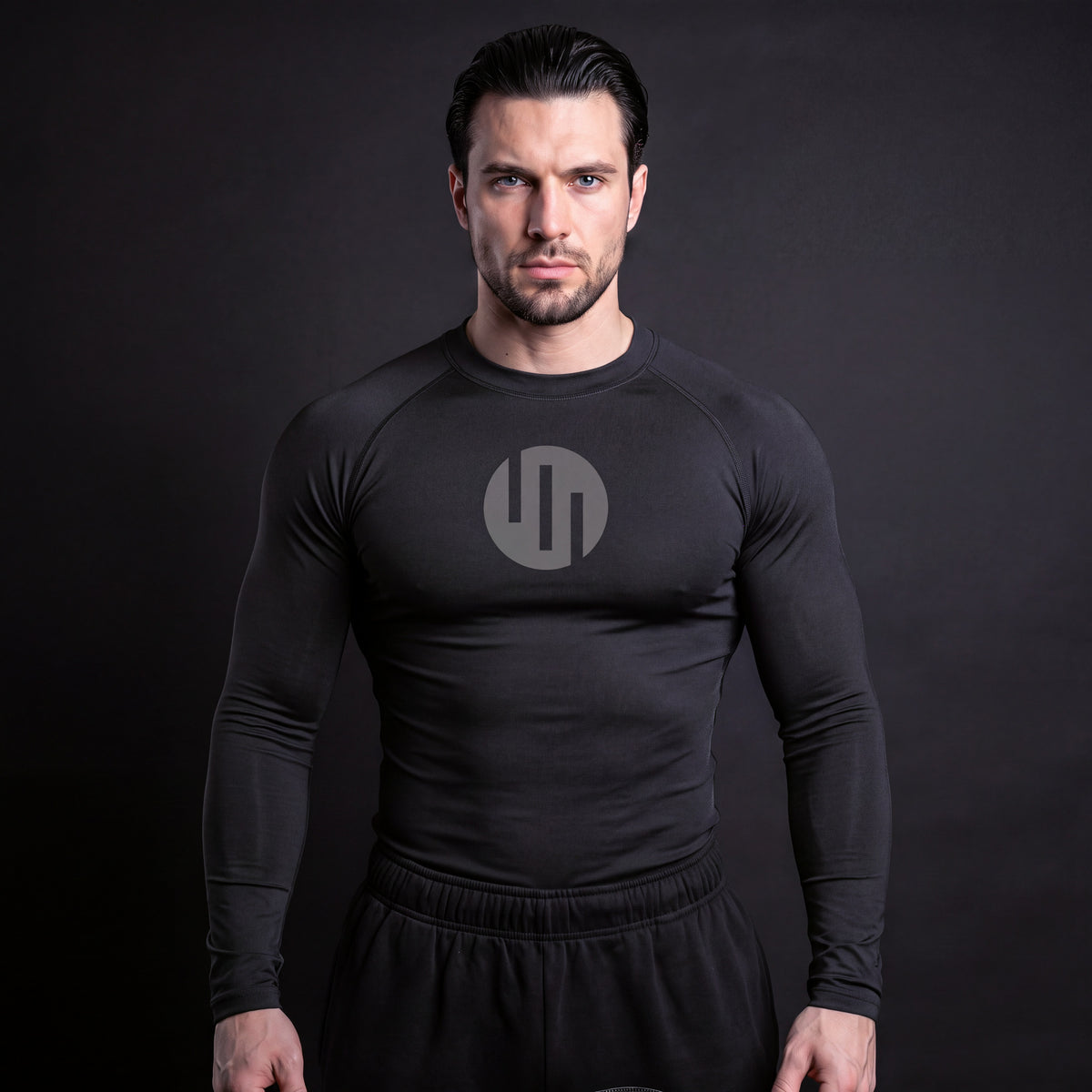 Viltrumite Compression Shirt Black & Gray long sleeve on model, front view