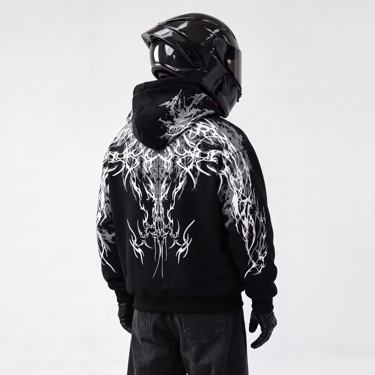 Thorn Reflective Hoodie, back view with rider helmet